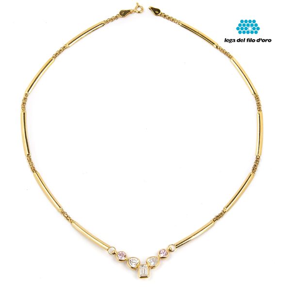 



COLLANA GIROCOLLO IN ORO GIALLO 18KT E PIETRE 