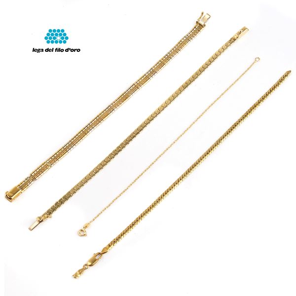 



QUATTRO BRACCIALI IN ORO GIALLO 18KT 