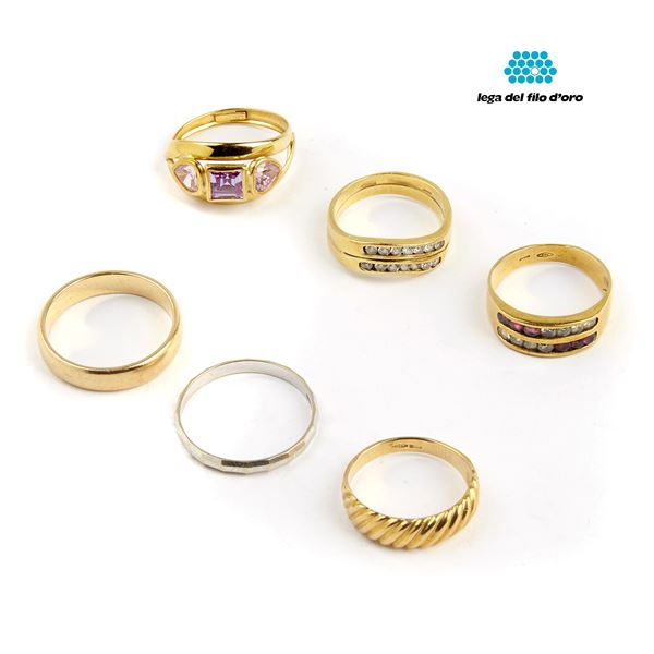 



SEI ANELLI IN ORO 18KT E PIETRE 