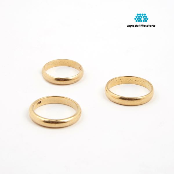 



TRE FEDI IN ORO GIALLO 18KT