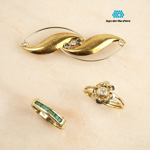 



DUE ANELLI IN ORO GIALLO 18KT E PIETRE
