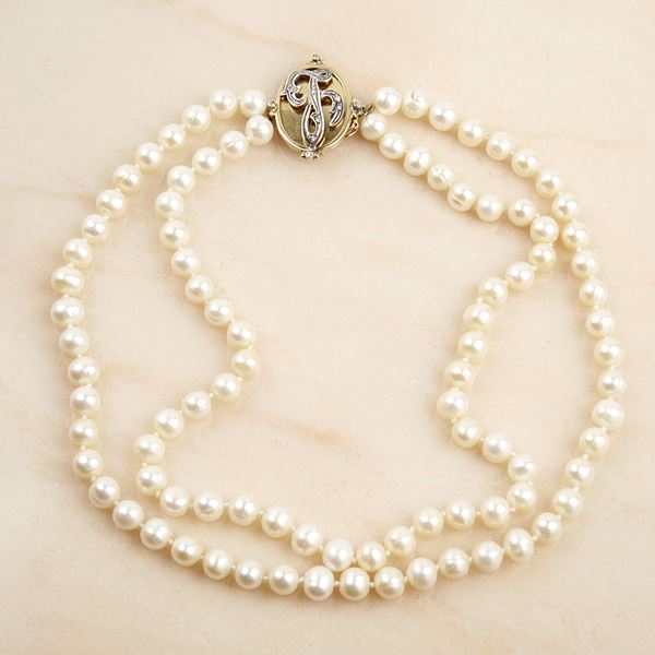 



COLLANA DI PERLE&nbsp; E ORO GIALLO, ORO BIANCO E DIAMANTI