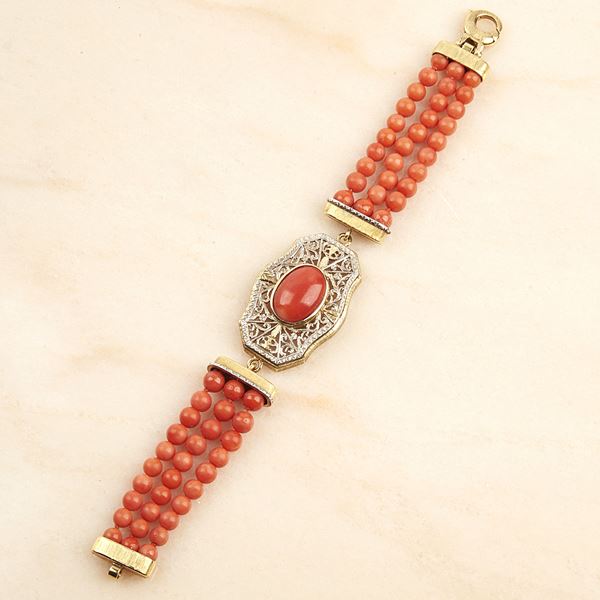 BRACCIALE IN ORO GIALLO , ORO BIANCO 18KT E CORALLO