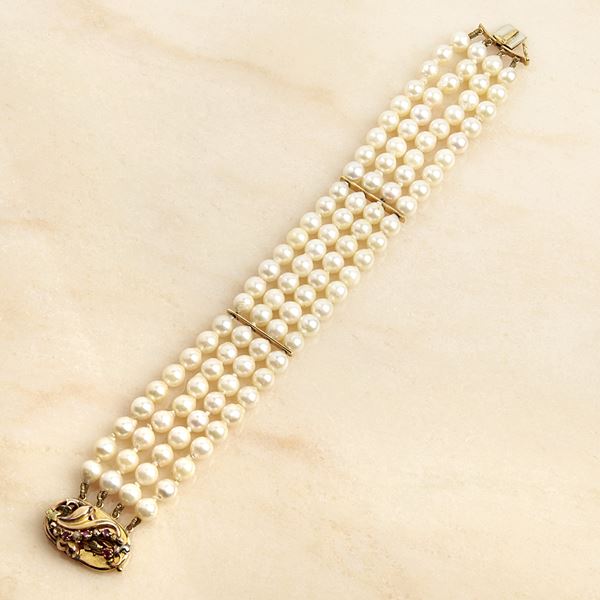



BRACCIALE IN ORO GIALLO 18KT E PERLE