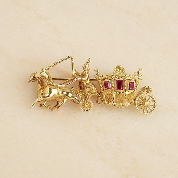 



SPILLA IN ORO GIALLO 18KT E PIETRE 