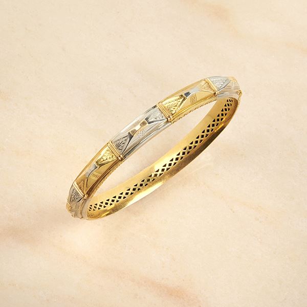 



BRACCIALE RIGIDO IN ORO GIALLO, ORO BIANCO 18KT