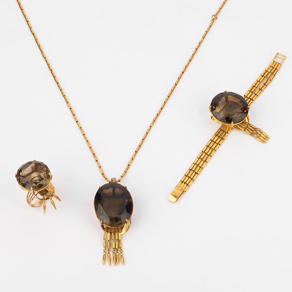 



PARURE IN ORO GIALLO 22KT E QUARZI