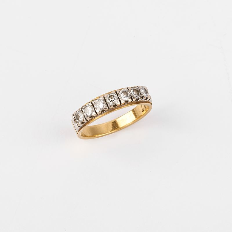 ANELLO A MEZZA FEDE IN ORO 18KT E DIAMANTI