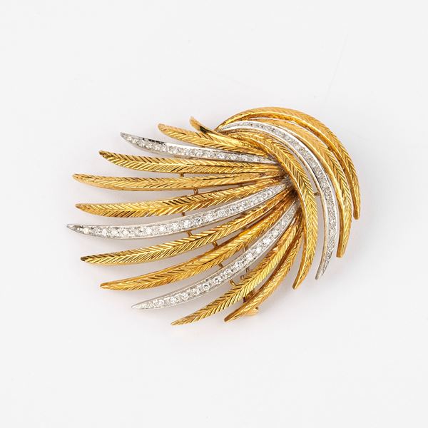 



SPILLA IN ORO GIALLO, ORO BIANCO, E DIAMANTI