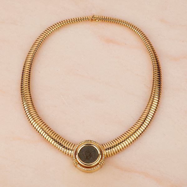 



GIROCOLLO IN ORO GIALLO 18KT E DIAMANTI