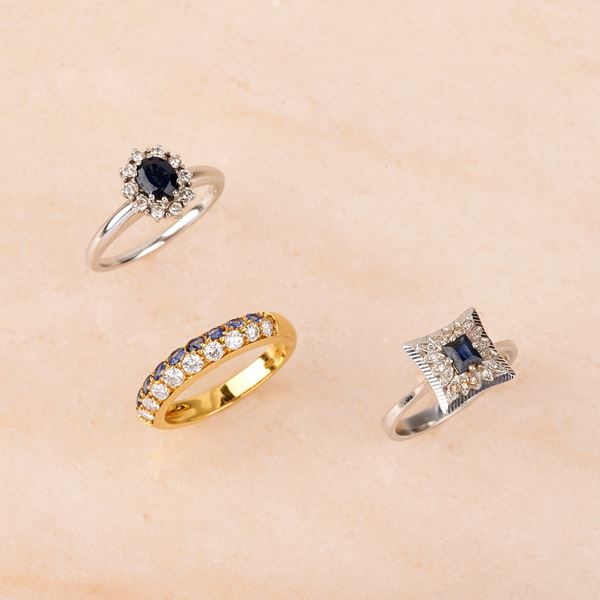 



ANELLO IN ORO GIALLO 18 KT, DIAMANTI E ZAFFIRI