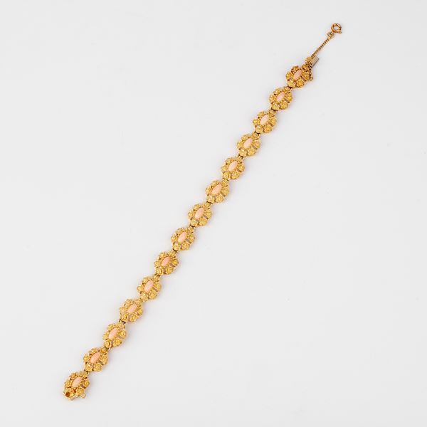 



BRACCIALE IN ORO GIALLO 18 KT E CORALLO