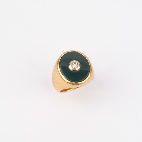 



ANELLO IN ORO GIALLO , DIAMANTE E ONICE