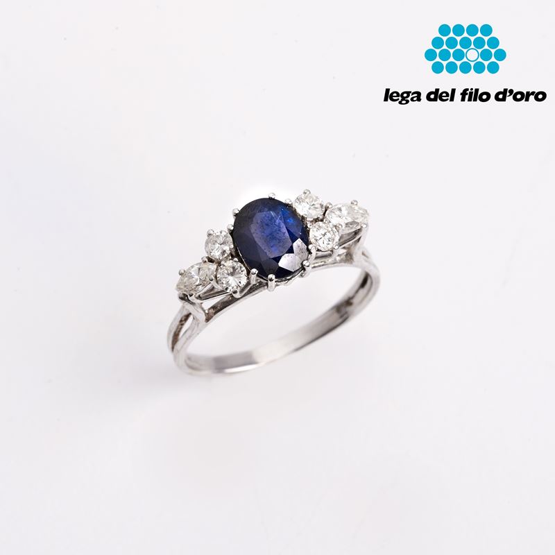 Anello in Oro Bianco 18kt , Diamanti e Zaffiro