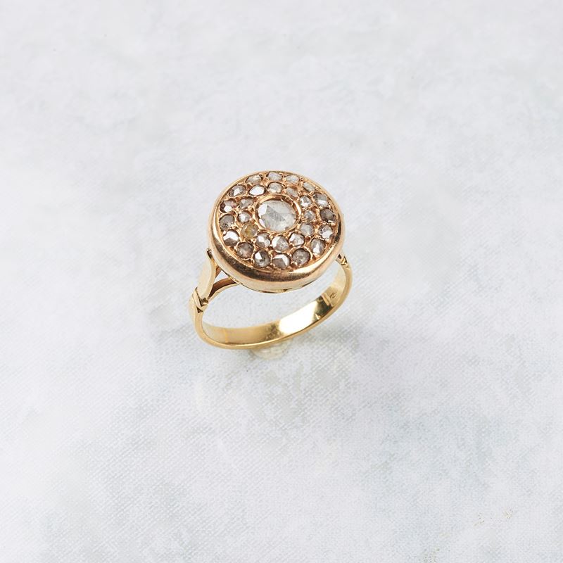 ANELLO IN ORO GIALLO 18KT E DIAMANTI