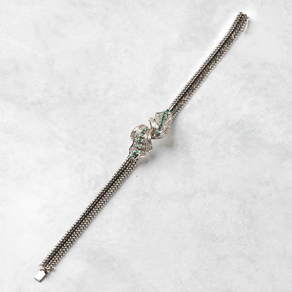 



BRACCIALE IN ORO BIANCO 18KT, DIAMANTI E RUBINI