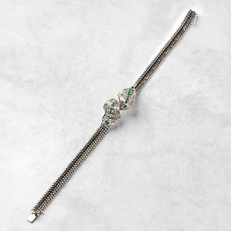BRACCIALE IN ORO BIANCO 18KT, DIAMANTI E RUBINI