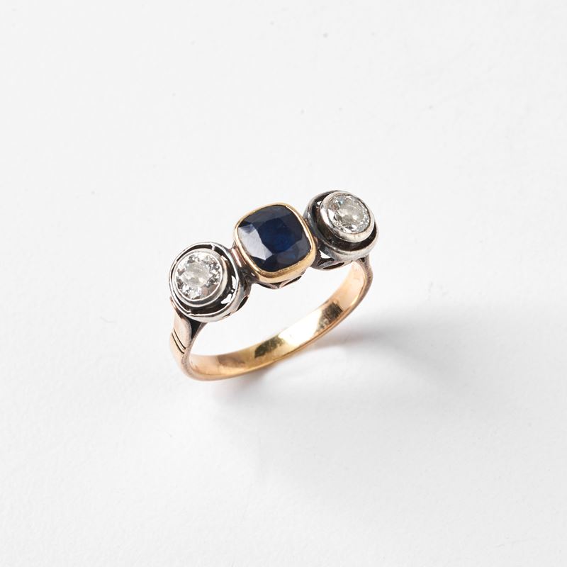 ANELLO IN ORO GIALLO 18KT, ARGENTO, DIAMANTI E ZAFFIRO
