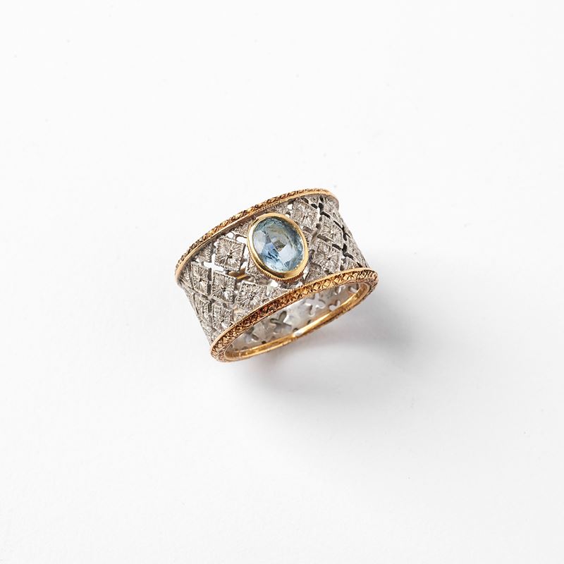 ANELLO IN ORO GIALLO, ORO BIANCO 18KT E TOPAZIO