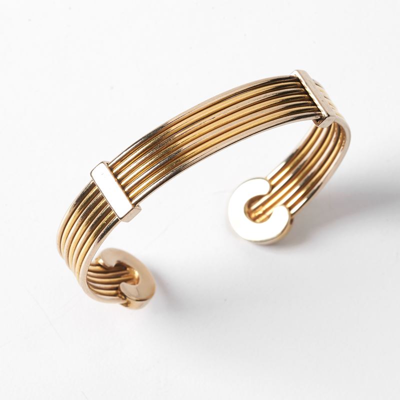 BRACCIALE SEMI RIGIDO IN ORO GIALLO, ORO BIANCO KT18