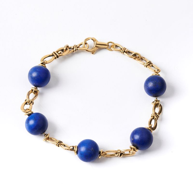BRACCIALE IN ORO GIALLO 18KT E LAPISLAZZULO