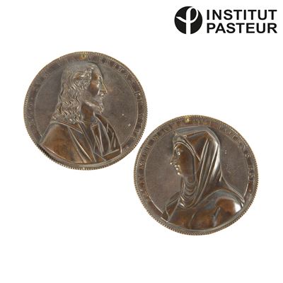 Placche circolari raffiguranti il Redentore e la Santa, bronzo, secc. XIX-XX