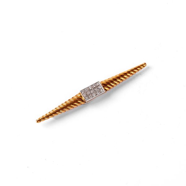 



SPILLA IN ORO GIALLO, ORO BIANCO 18KT E DIAMANTI