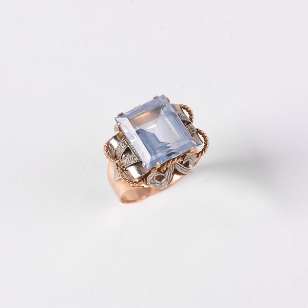 



ANELLO IN ORO E ARGENTO CON PIETRA AZZURRA