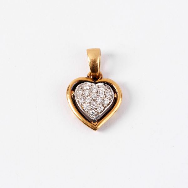 



PENDENTE IN ORO GIALLO 18KT E DIAMANTI