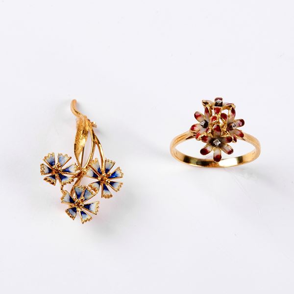 



SPILLA E ANELLO IN ORO GIALLO 18KT E SMALTI