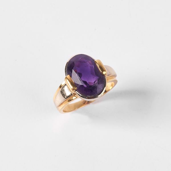 



ANELLO IN ORO GIALLO 18KT, ORO BIANCO E AMETISTA