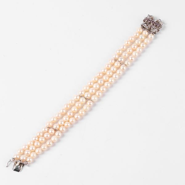 



BRACCIALE DI PERLE, ORO 18KT E ZAFFIRI 