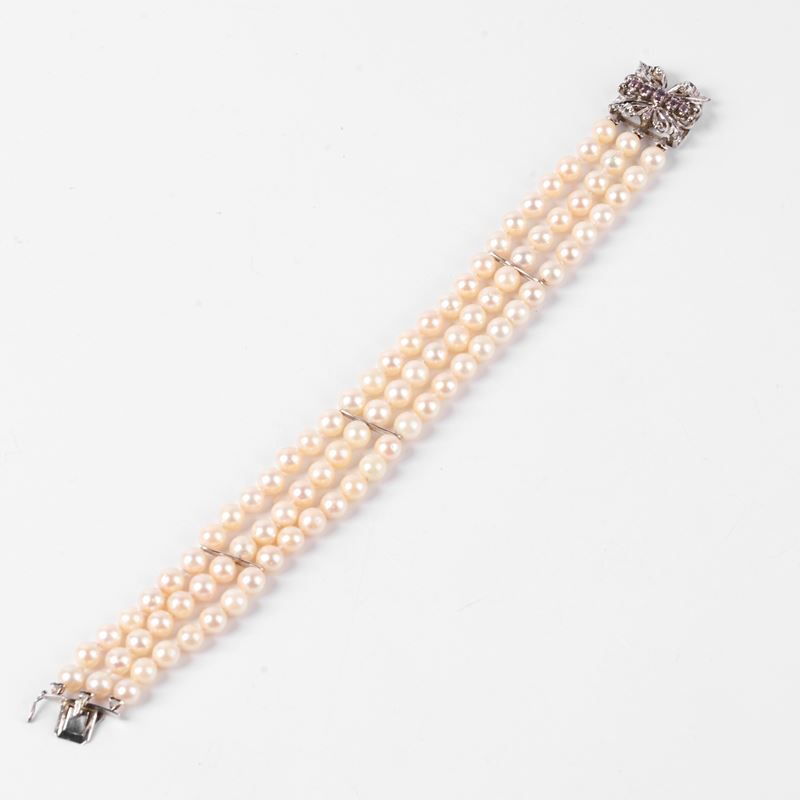 BRACCIALE DI PERLE, ORO 18KT E ZAFFIRI