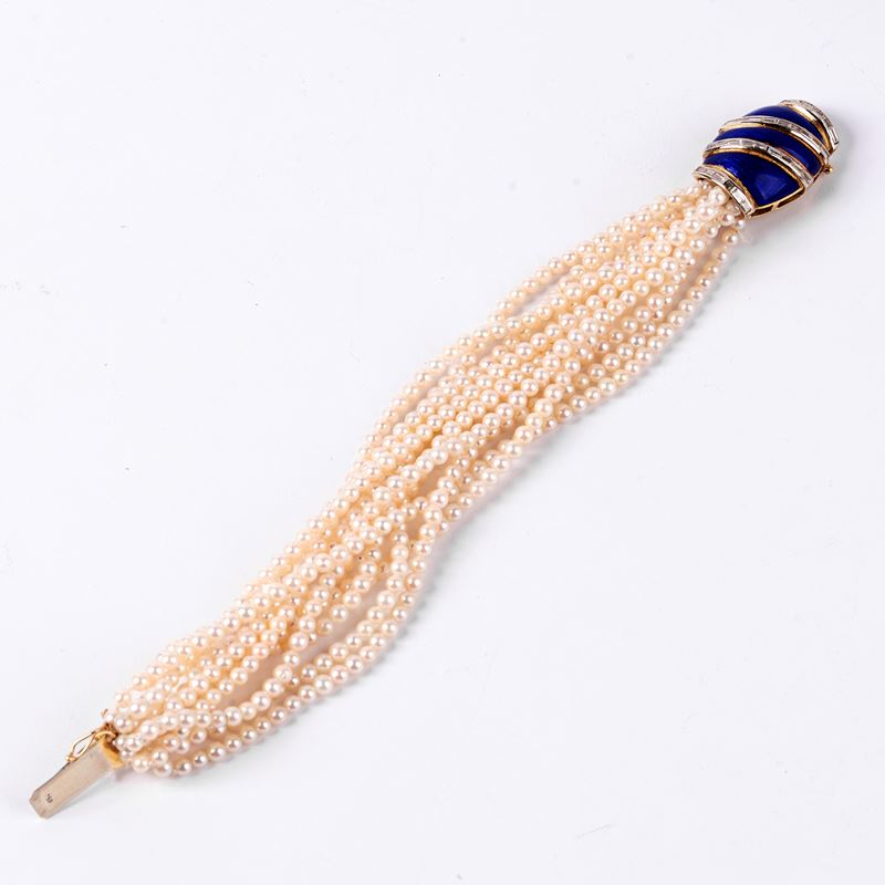 BRACCIALE IN ORO 18KT, DIAMANTI E PERLE