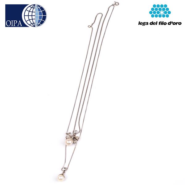 



COLLANA GIROCOLLO IN ORO BIANCO 18KT&nbsp; E PERLE