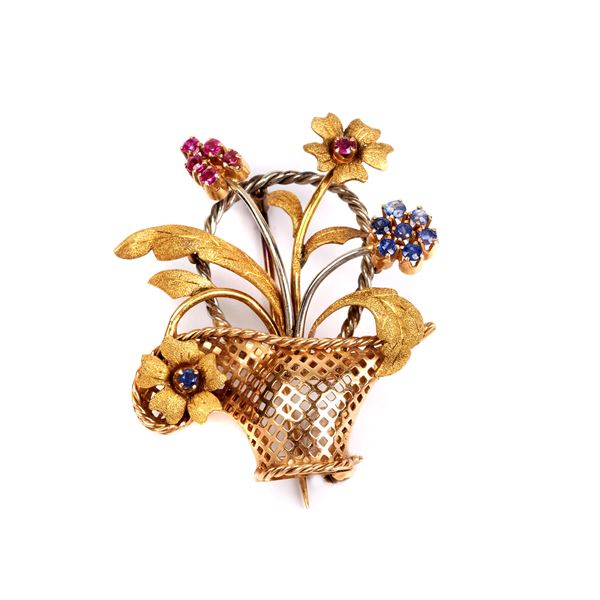 



SPILLA IN ORO GIALLO, ORO BIANCO 18KT, ZAFFIRI E RUBINI