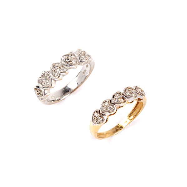 



DUE ANELLI IN ORO GIALLO E ORO BIANCO 18KT E PIETRE 