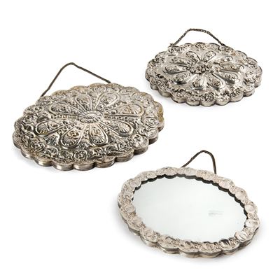 Tre specchi con montature in argento sbalzato, sec. XX