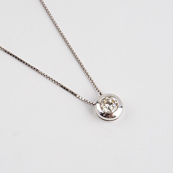 



COLLANA PUNTO LUCE IN ORO BIANCO 18KT E DIAMANTE