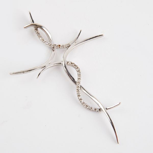 



PENDENTE IN ORO BIANCO 18KT E DIAMANTI