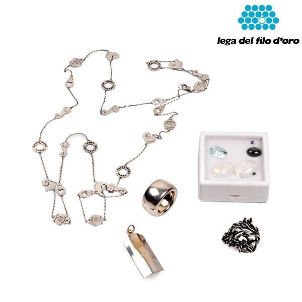 



MEDAGLIETTA IN ORO 18KT