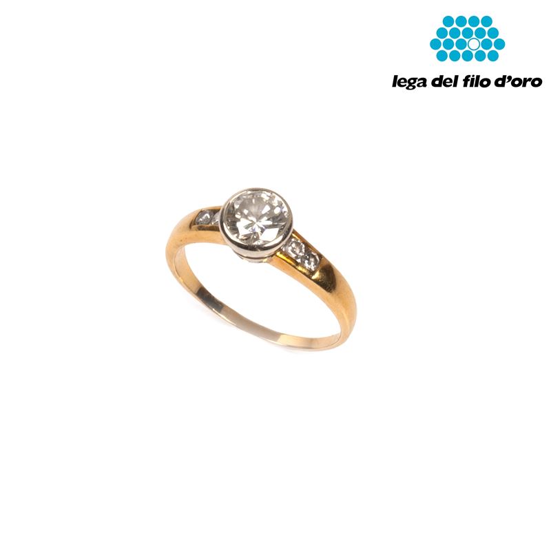 ANELLO IN ORO GIALLO 18KT E DIAMANTI