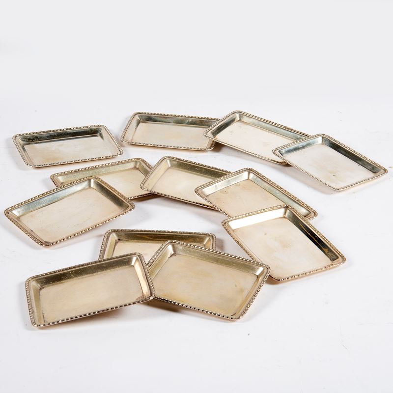 Dodici vassoietti di forma rettangolare, sec. XX