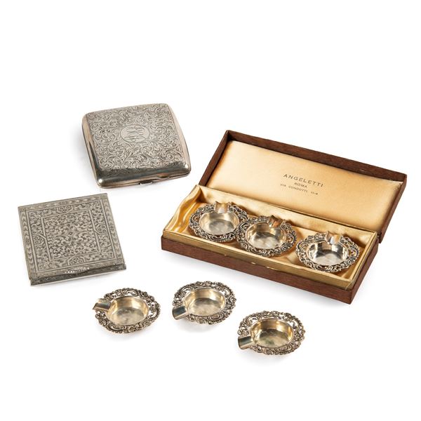 



DUE PORTASIGARETTE E SEI PICCOLI POSACENERE 