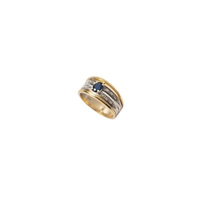 Anello in oro giallo e bianco con diamanti e zaffiro