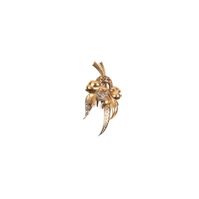 Spilla in oro giallo 18kt con diamanti a motivo floreale