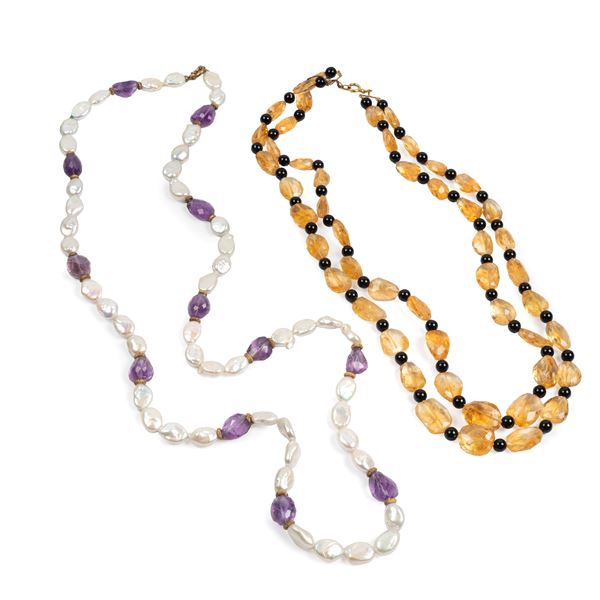 



COLLANA DI MADREPERLA E PIETRE