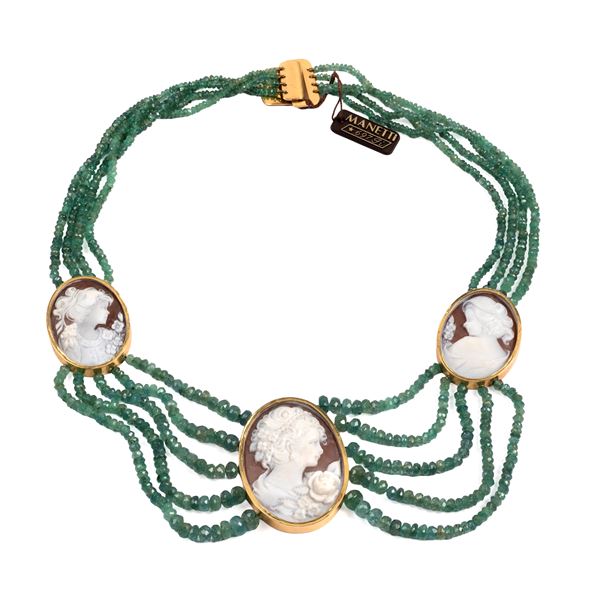 



COLLANA IN ORO 18KT, SMERALDI E CAMMEI