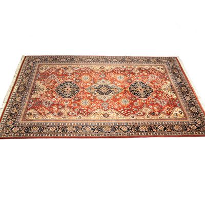 Tappeto persiano Tabriz, firmato, campo geometrico con fiori stilizzati, sec. XX