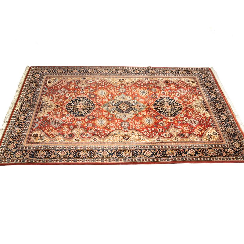 Tappeto persiano Tabriz, firmato, campo geometrico con fiori stilizzati, sec. XX